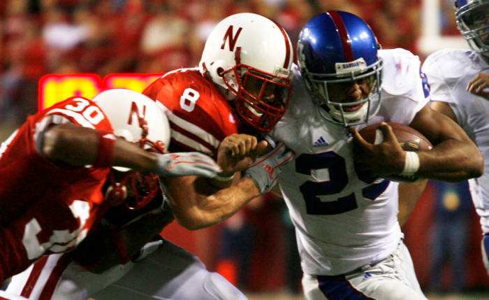 2006 Nebraska-Kansas football 4Q2 USATSI_2187134 Tierre Green and Andrew Shanle tackle